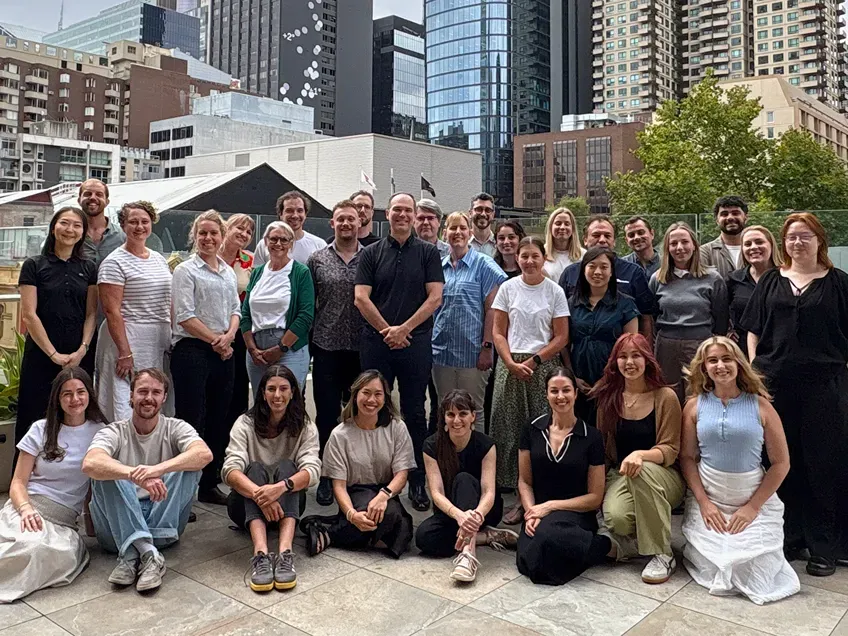 The Voconiq team, gathered on a Melbourne rooftop.